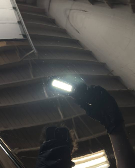 The same Corvette paint under an inspection light after correction and coating