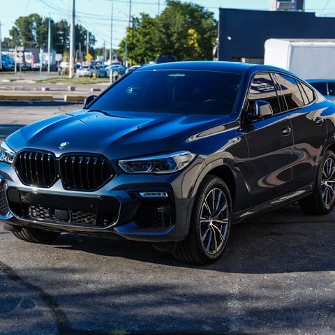 Dark blue BMW SUV with a deep gloss finish