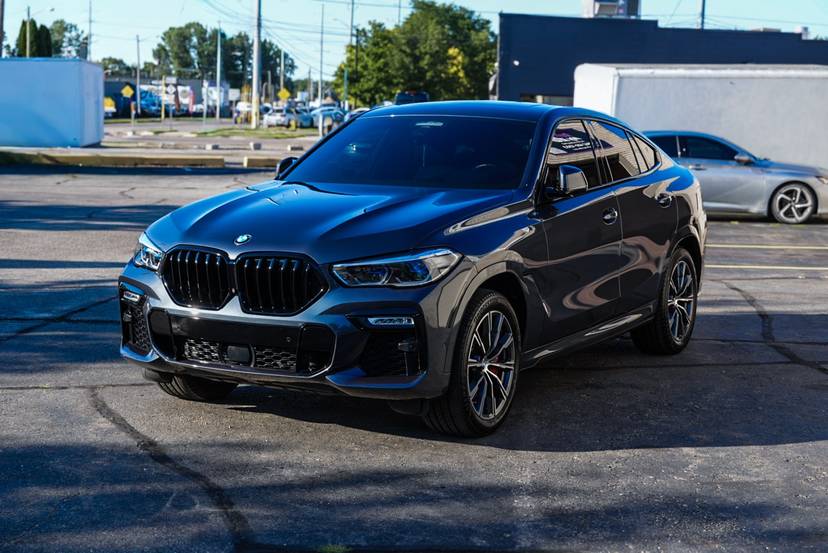 Dark blue BMW SUV with a deep gloss finish