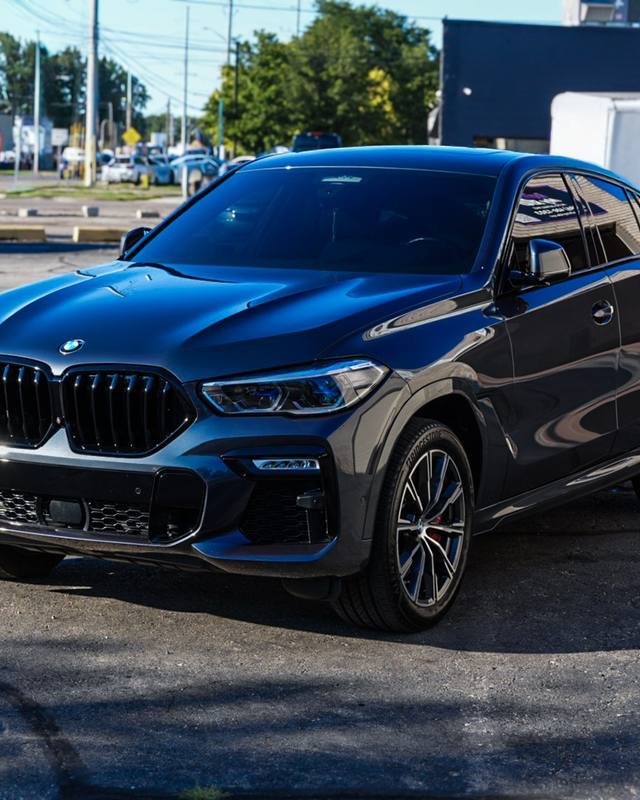 Dark blue BMW SUV with a deep gloss finish