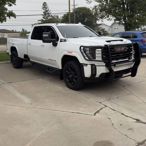 White GMC pickup parked outside