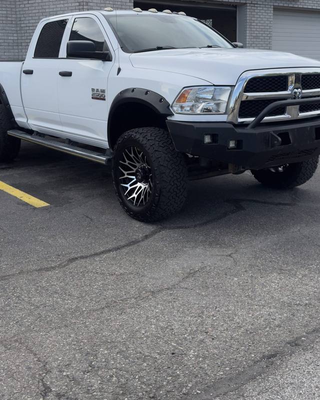 White Ram pickup outside the shop