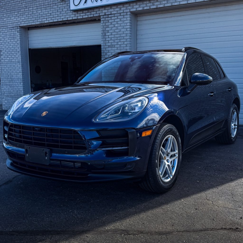 Blue Porsche SUV detailed inside and out